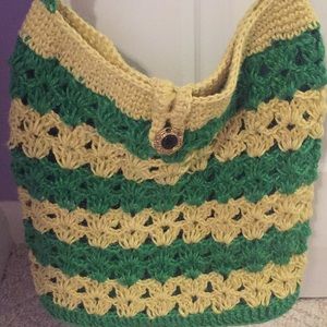Handmade, knit/crochet, satin lined, green purse.